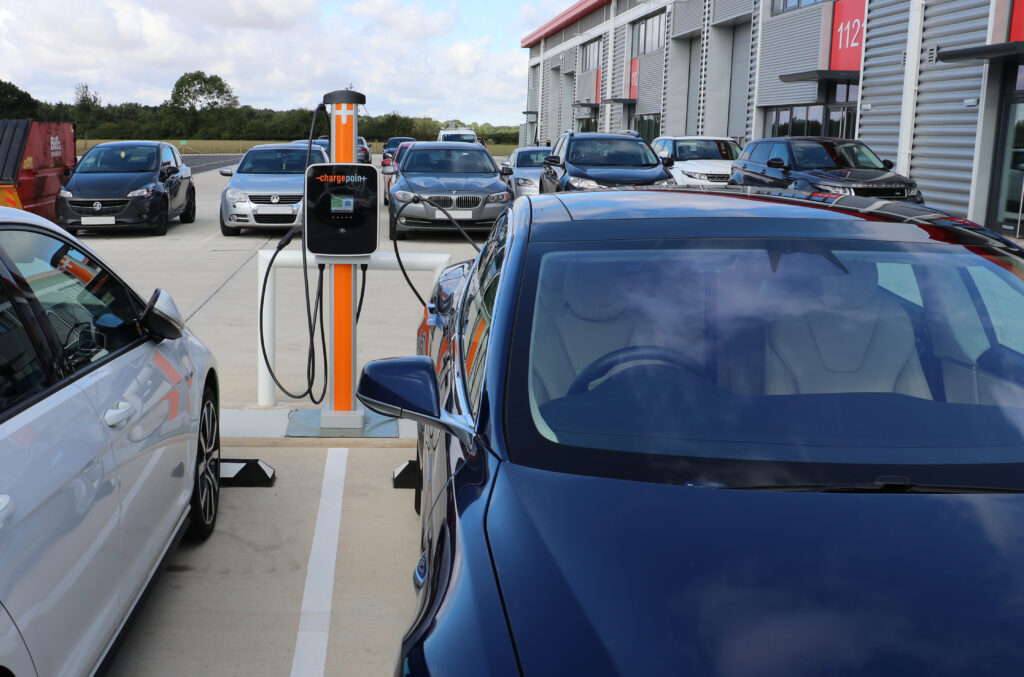 Rapid charger in company car park charging two vehicles at once