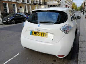 White electric car Renault Zoe parked on the street in London